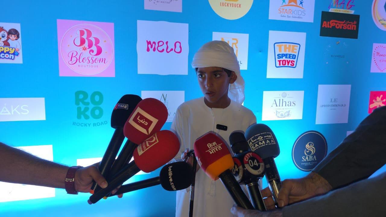 Sheikh Khalifa bin Dhiyab Al Nahyan with young entrepreneurs at Hawamir Freejna